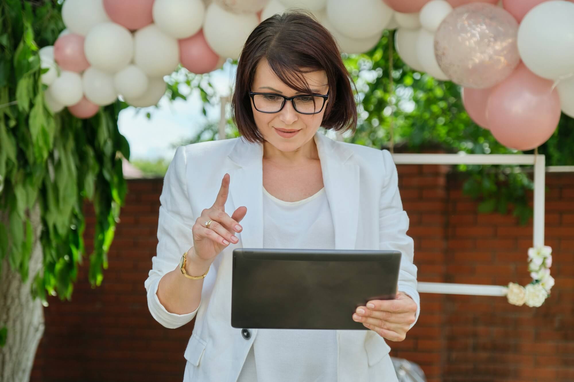 portrait-of-mature-business-woman-small-business-owner-organizing-events-parties-weddings.jpg